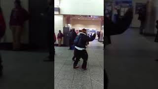 NYC-dance party in Penn Station. Sugar Bear Kahn Hightower
