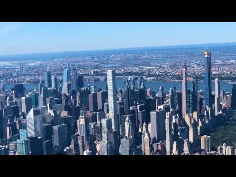 Midtown (NYC) Skyline Flying Over The East River