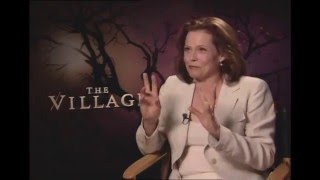 Sigourney Weaver talks with Jimmy Carter -The Village