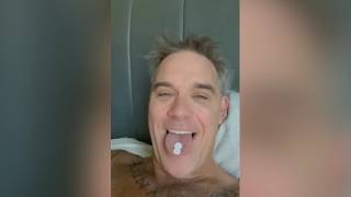 Robbie Williams sets the record straight on viral video speculation