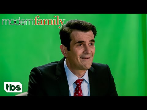 Phil Scrubs The Evidence from Cam & Mitch's Wedding Video (Clip) | Modern Family | TBS