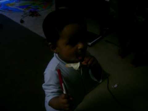 Aug 21st 2009--- Shalika eating ice cream by herself