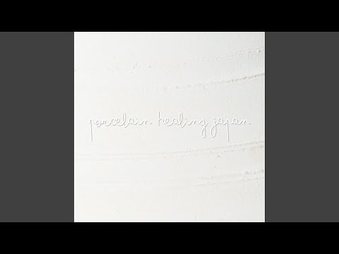 statue-jardin-zen-bouddha-végétation-opulente-plantes-aquatiques