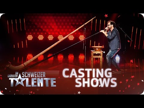 Enrico Lenzin taps with the alphorn | DGST | SRF