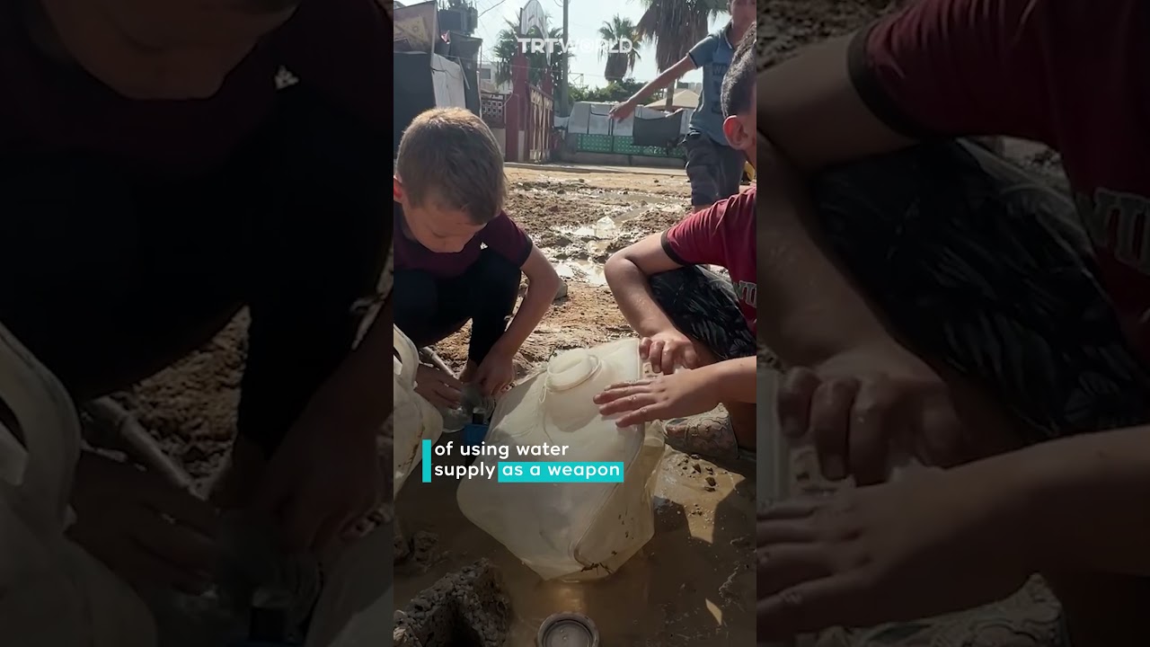 Displaced children in Gaza fill containers with contaminated water from leaking pipes