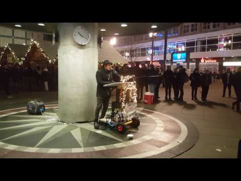 A music performer in Alexanderplatz, Berlin.