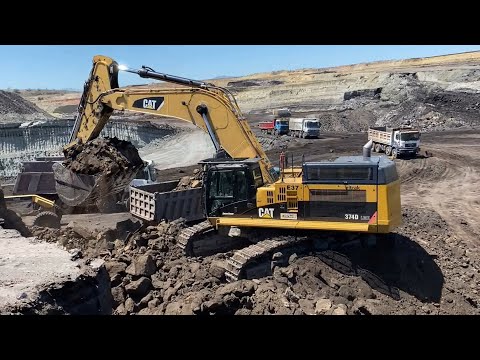 Caterpillar 374D Excavator Loading Trucks