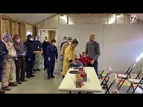 Watch: Family celebrates child's first birthday in quarantine at Camp Ashland