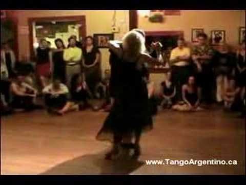  Mary Ann Casas  and  Oscar Casas  are  dancing  to  the  tango  "  Pan Comido  "