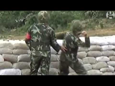 Grenade falls down during Chinese army training