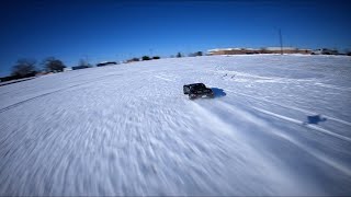Skydio 2 And An FPV Drone Tracking The Arrma Mojave EXB At The Same Time In The Snow