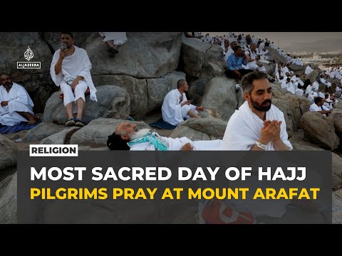 Pilgrims gather at Mount Arafat for the most sacred day of Hajj as temperatures top 40C