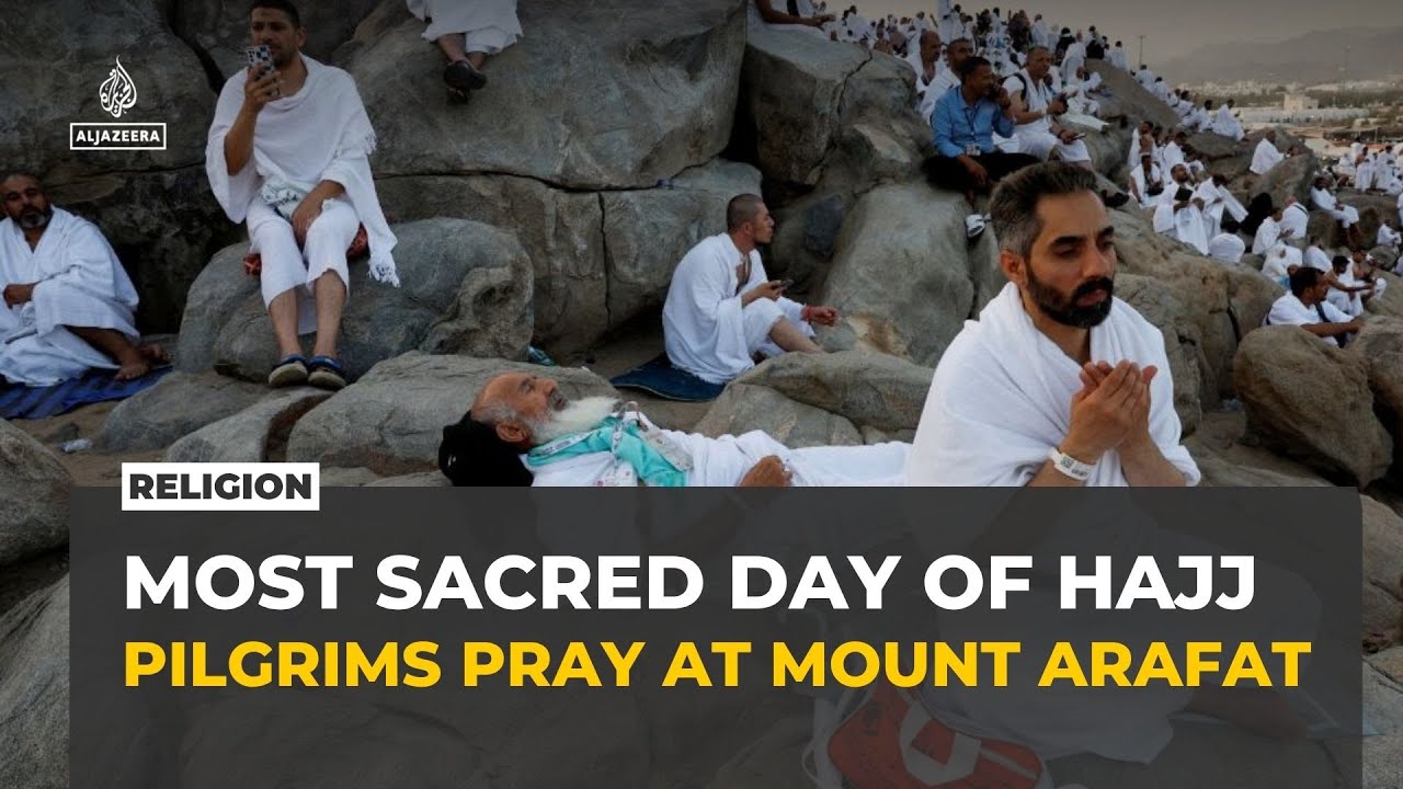 Pilgrims gather at Mount Arafat for the most sacred day of Hajj as temperatures top 40C