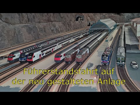 Cab ride over the newly designed layout with plenty of Swiss rolling stock - pure train action