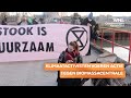 Klimaatactivisten blokkeren toegangsbrug energiecentrale: 'Weggegooid belastinggeld'