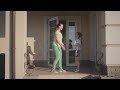 The Mother Kissing Her Daughter Standing On The Porch Of A Big House Stock Footage Videohive