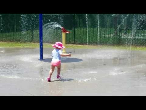 Carson playing in the splash padat Hill Ridge Farm