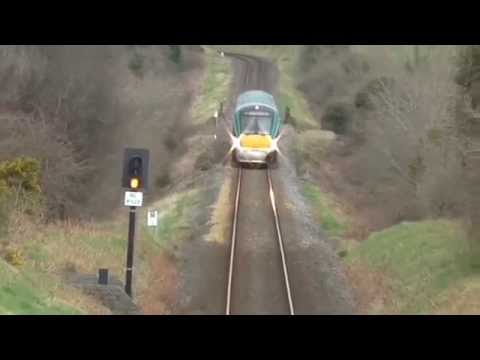IE 29k and a IE 22k passes under the kish railway bridge