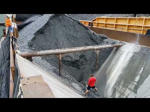 Barge unloading 3500 tons of coal!  Hard work