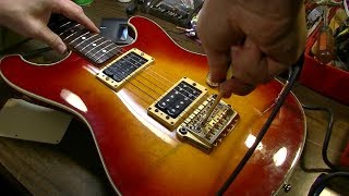 This Guitar Bridge was Designed by a Circus Clown on LSD - Ibanez Roadstar II RS-1000