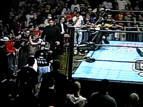 Mike Awesome puts Spike Dudley through a table