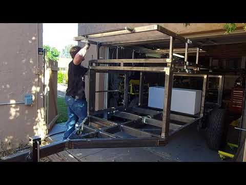 Adjustable height tent rack