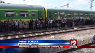 Migrants in tense standoff with Hungarian police