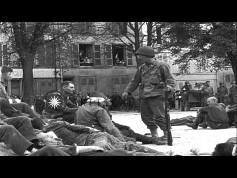 US medical unit set up in town square attends to wounded people in Troyes, France...HD Stock Footage