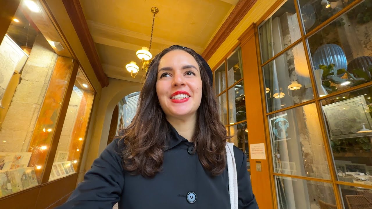 A traveler walks through Covered Passages of Paris.