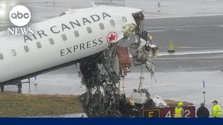 Video shows moment Air Canada plane hit fire truck at LaGuardia Airport 