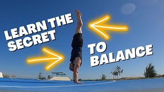 Learn to Balance and Rebalance a Handstand