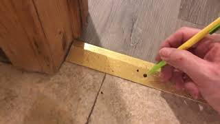 How to attach a threshold to concrete slab/ cement slab.  Metal threshold to cement