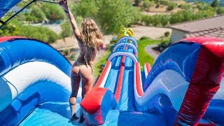 WORLD'S LARGEST BACKYARD WATERSLIDE! (100ft+)