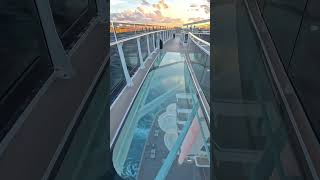 Walking the top open decks of MSC World Europa at sunrise feels unreal.
