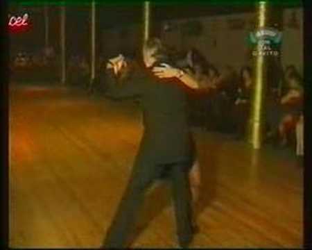  Carlos Gavito  and  Marcela Duran  are  dancing  to  the  vals  "  Romance de Barrio  "