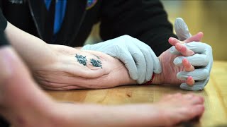 With new arms, a soldier builds his future
