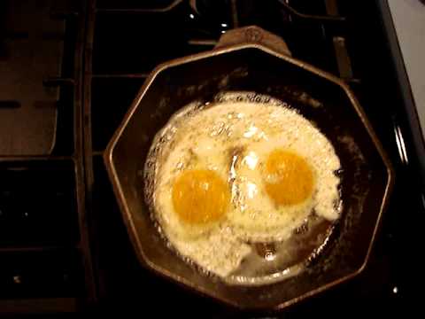 Finex no 8 cast iron skillet cooking an egg with a flip