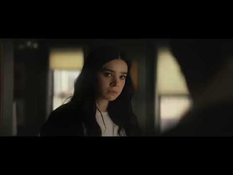 Marvel Studios’ Hawkeye official trailer frame with Clint and Kate in holiday-lit New York