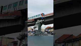A metro bridge with a train on it began to collapse after one of the supports gave way in the city