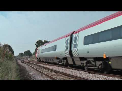 57302 and 390026 on 1A48, 13:15, Liverpool Lime Street - London Euston