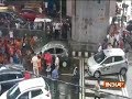 Kanwariyas vandalises a car after it accidently touches one of their member in Delhi
