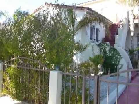 Updated Spanish Triplex West of La Brea with 8% Cap Rate