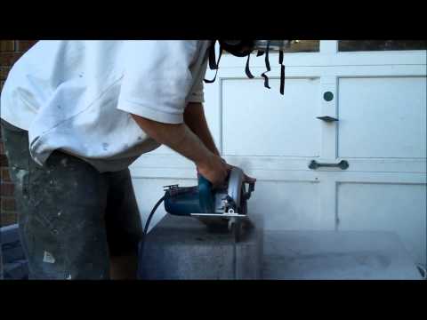 Cut a cement block with a diamond blade.