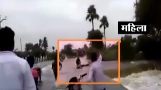 Caught on Camera: Wife and Husband Washed Away in Flood in Telangana