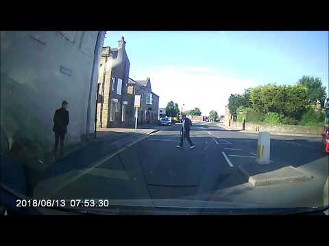 stupid old man walks across road in path of oncoming car ossett