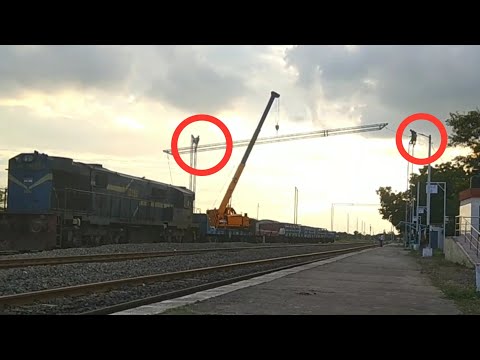 High electrification for double stack trains & Difficult work by employees, clip 1