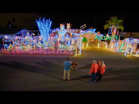 Cactus Santa and Lots of Moose Delight in The Moussette Family's Display - The Great Christmas Light