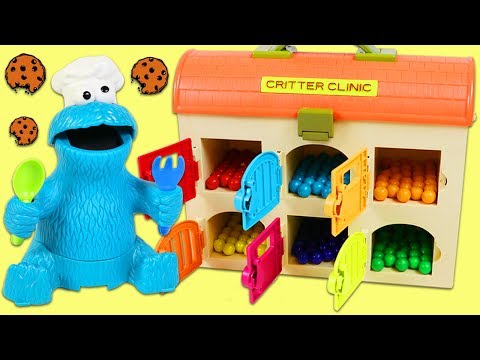 Sesame Street Cookie Monster Eats Rainbow Gumballs!