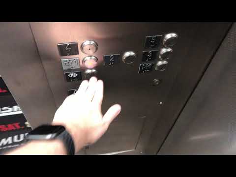 4K 60fps: OTIS Traction Elevators At Fremont Street Experience Parking Garage - Las Vegas, Nevada