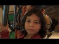 Laura Rides The Central Park Carousel